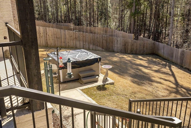 view of yard with a patio and a jacuzzi