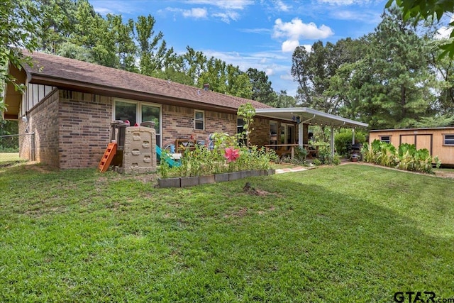 412 Peach Tree Dr, Palestine, TX 75803 - back of house featuring brick siding