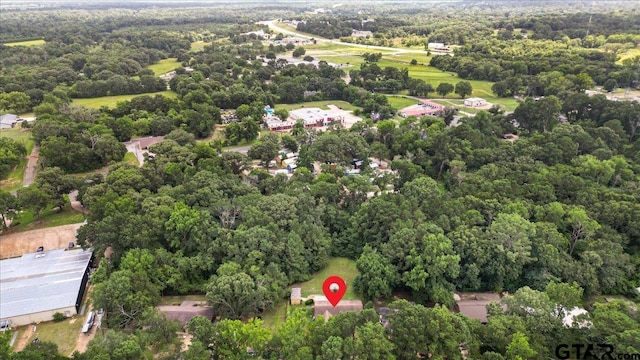 412 Peach Tree Dr, Palestine, TX 75803 - aerial view of property and surrounding area with a forest