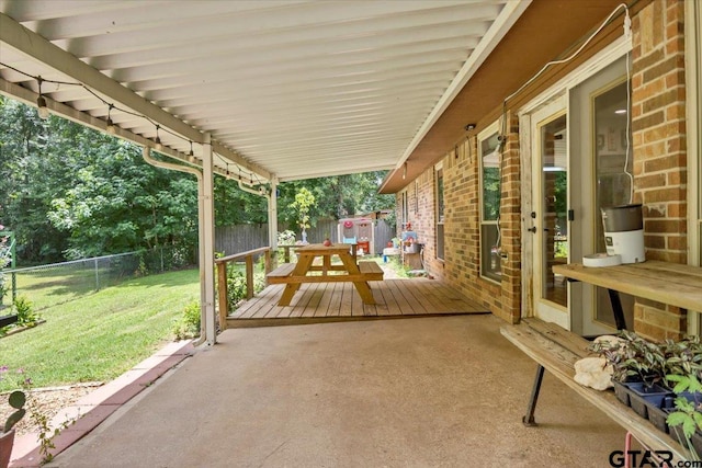 412 Peach Tree Dr, Palestine, TX 75803 - fenced backyard with a patio
