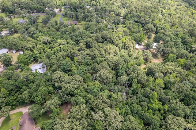 14677 County Road 2337, Tyler, TX 75707 - aerial view of property and surrounding area with a heavily wooded area