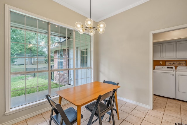 14677 County Road 2337, Tyler, TX 75707 - dining space featuring washer and dryer, crown molding, a chandelier, light tile patterned flooring, and baseboards