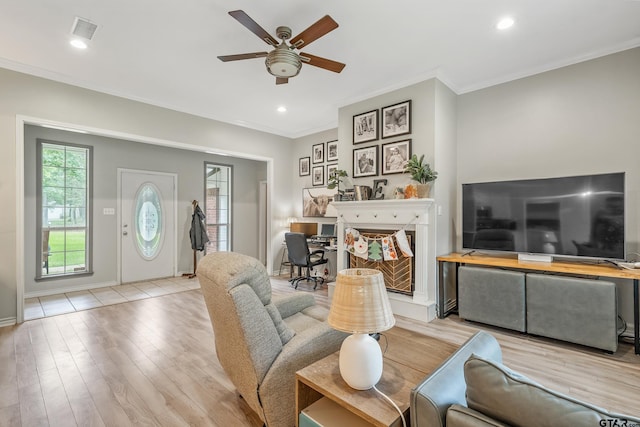 14677 County Road 2337, Tyler, TX 75707 - living area with crown molding, ceiling fan, light wood finished floors, an office area, and recessed lighting