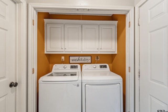 14677 County Road 2337, Tyler, TX 75707 - clothes washing area with washer and clothes dryer and cabinet space