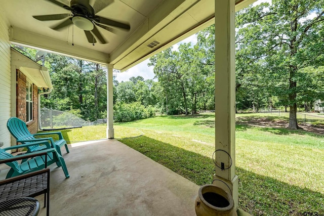 14677 County Road 2337, Tyler, TX 75707 - view of patio / terrace with a ceiling fan and view of scattered trees
