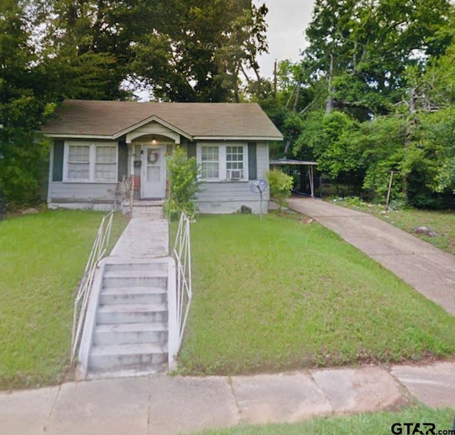 bungalow with a front lawn