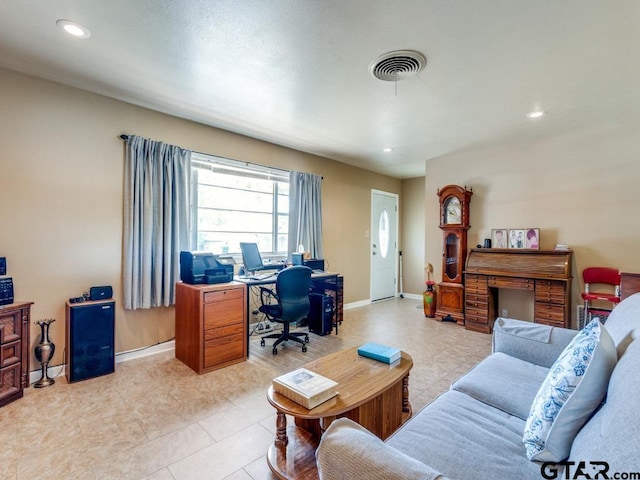 living room featuring light tile patterned flooring