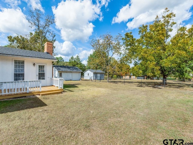 view of yard featuring a deck