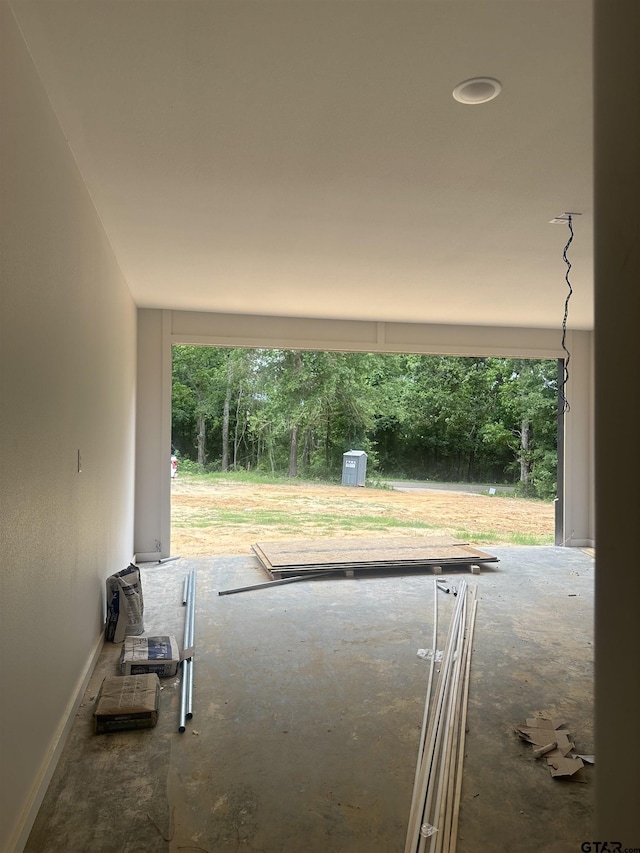 exterior space with plenty of natural light and baseboards