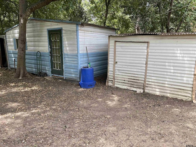 view of outbuilding featuring an outbuilding