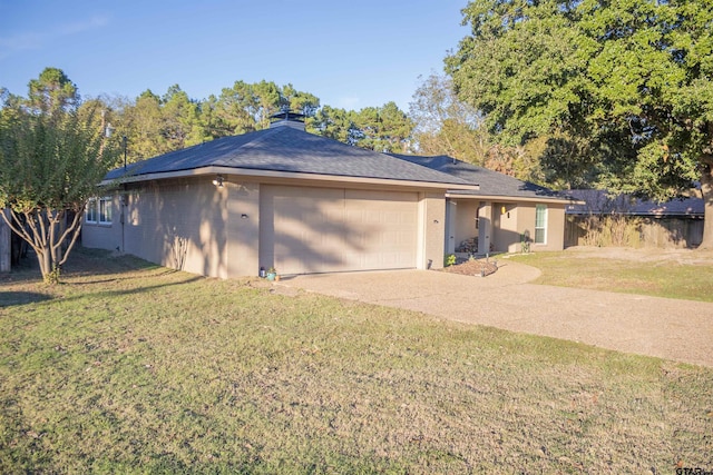 single story home with a garage and a front yard