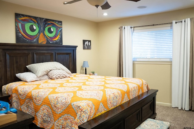 bedroom with light colored carpet and ceiling fan