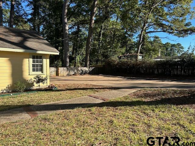 view of yard featuring fence