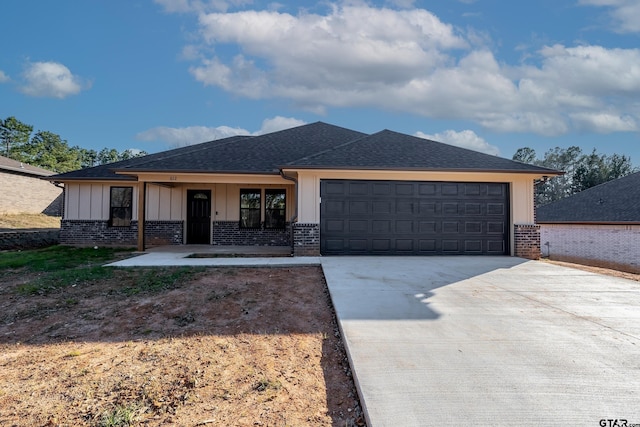 view of front of home with a garage