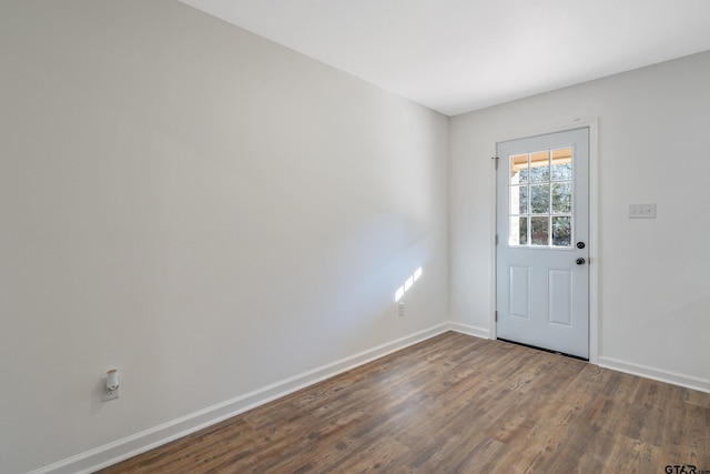 interior space with dark hardwood / wood-style flooring