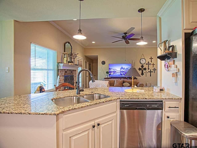 kitchen featuring crown molding, ceiling fan, a sink, open floor plan, and stainless steel dishwasher