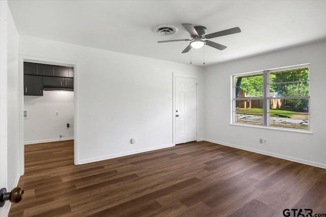 1612 Woodland Hills Dr, Tyler, TX 75701 - empty room with ceiling fan and dark wood-style flooring