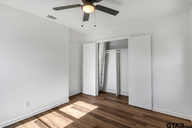 1612 Woodland Hills Dr, Tyler, TX 75701 - unfurnished bedroom with wood finished floors, a closet, and a ceiling fan