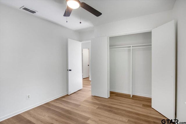 1612 Woodland Hills Dr, Tyler, TX 75701 - unfurnished bedroom featuring light wood-style flooring, a closet, and a ceiling fan