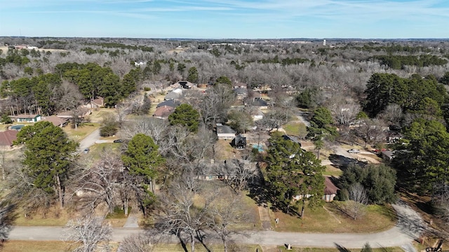 drone / aerial view with a view of trees