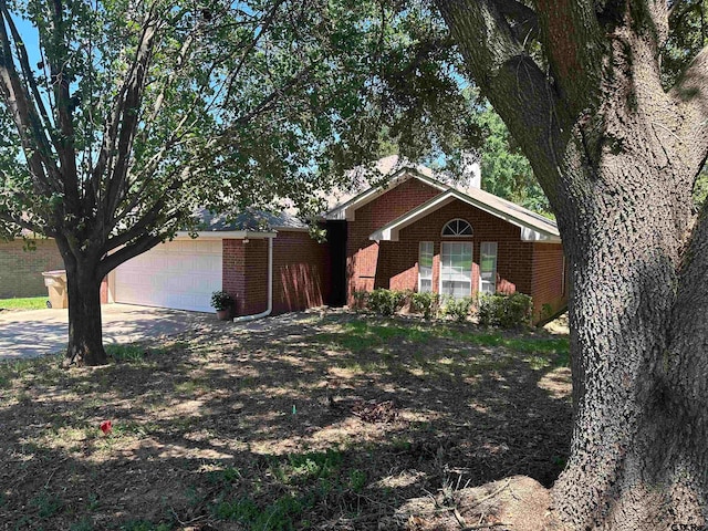 ranch-style home with a garage