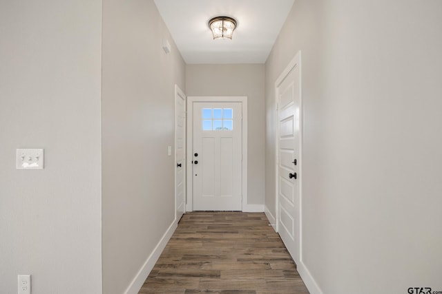 entryway featuring dark wood-type flooring