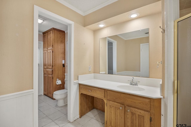 bathroom featuring tile patterned flooring, ornamental molding, a shower with door, and toilet