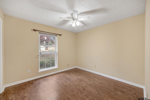 unfurnished room with ceiling fan, hardwood / wood-style flooring, and a textured ceiling