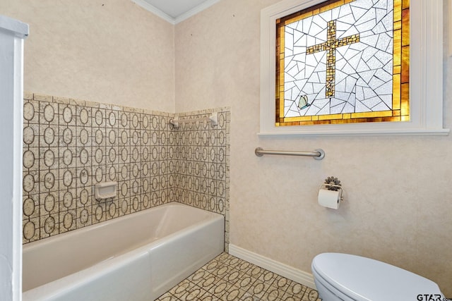 bathroom with tile patterned flooring, a tub to relax in, ornamental molding, and toilet