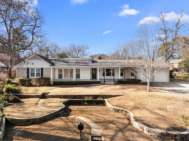 ranch-style home with a garage