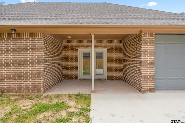 doorway to property featuring a patio area