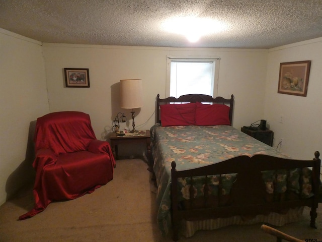 bedroom with crown molding, carpet flooring, and a textured ceiling