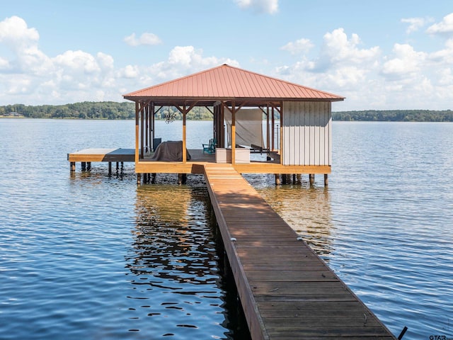 view of dock with a water view