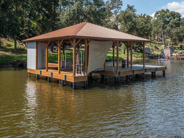 view of dock with a water view