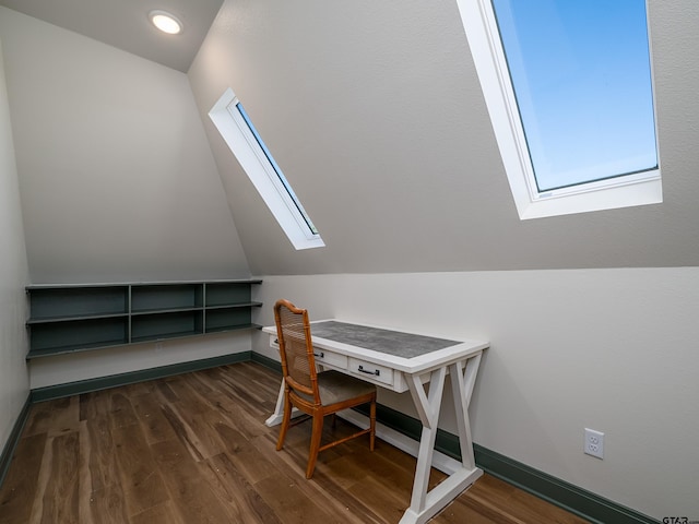 office featuring vaulted ceiling with skylight, dark wood-style flooring, recessed lighting, and baseboards