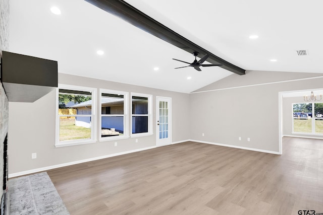 unfurnished living room with lofted ceiling with beams, visible vents, baseboards, light wood-style floors, and ceiling fan with notable chandelier