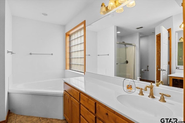 bathroom featuring vanity, separate shower and tub, and tile patterned flooring