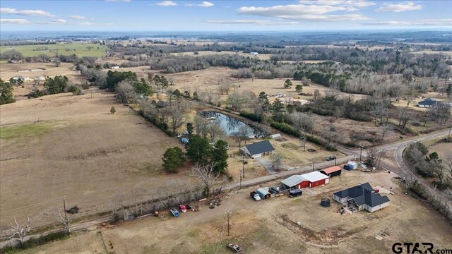 aerial view featuring a water view and a rural view