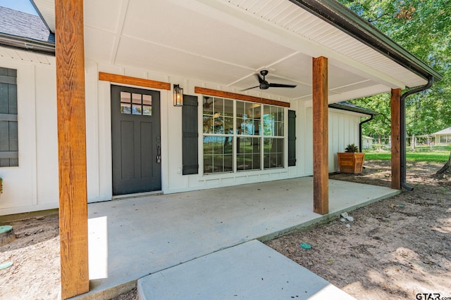 doorway to property with ceiling fan and a patio