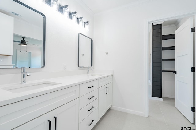 bathroom featuring vanity, ceiling fan, ornamental molding, and tile patterned floors