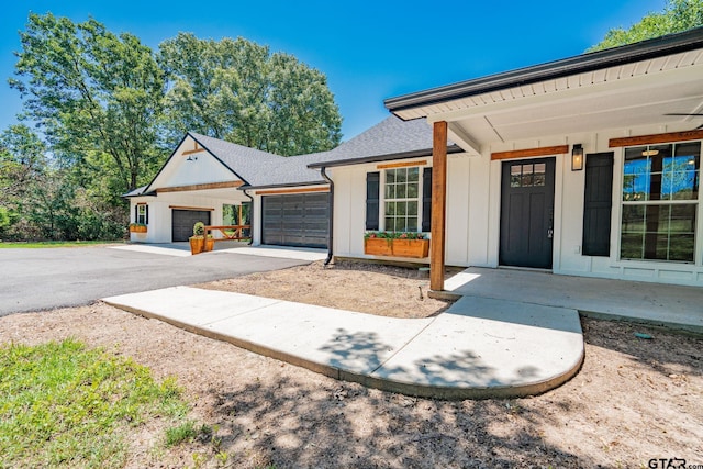 view of front of property with a garage