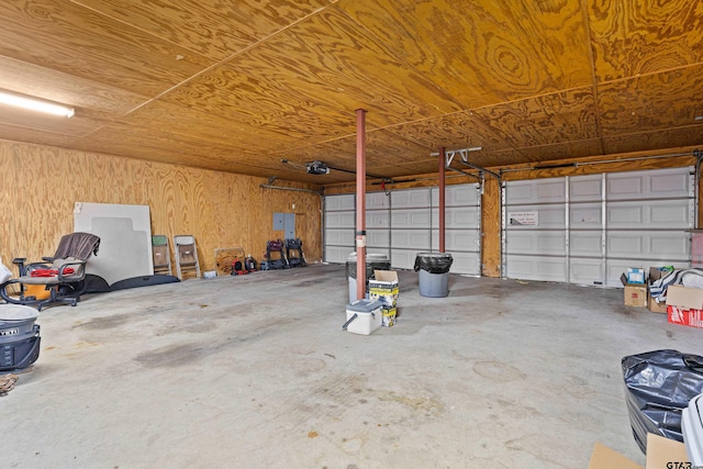 10929 County Road 41, Tyler, TX 75706 - garage with a garage door opener and wood ceiling