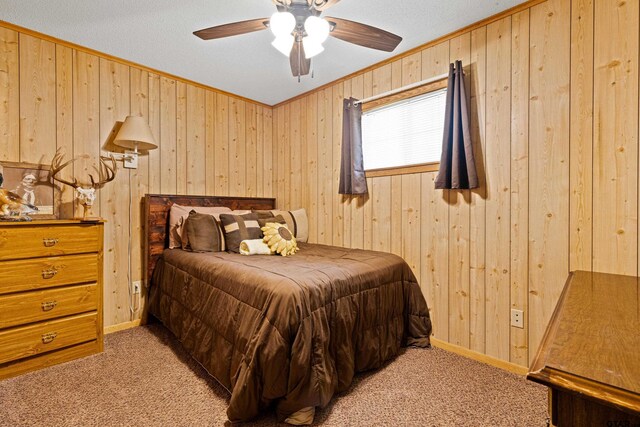 10929 County Road 41, Tyler, TX 75706 - bedroom with light carpet, crown molding, wood walls, and a ceiling fan
