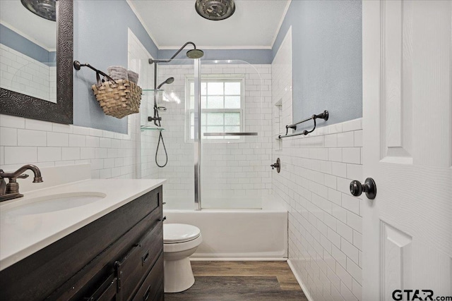 3268 Farm Rd Unit 1487, Bogata, TX 75417 - full bathroom featuring tile walls, vanity, wood finished floors, bathtub / shower combination, and crown molding