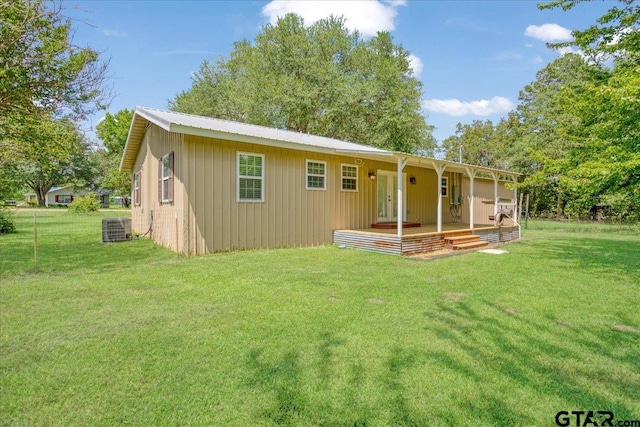 3268 Farm Rd Unit 1487, Bogata, TX 75417 - view of front of house with a front lawn and a metal roof