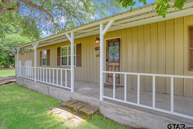 3268 Farm Rd Unit 1487, Bogata, TX 75417 - view of exterior entry featuring a porch