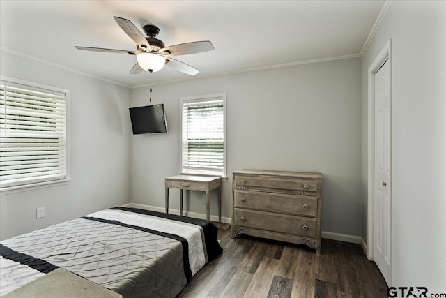 3268 Farm Rd Unit 1487, Bogata, TX 75417 - bedroom with dark wood-style flooring, ornamental molding, and ceiling fan