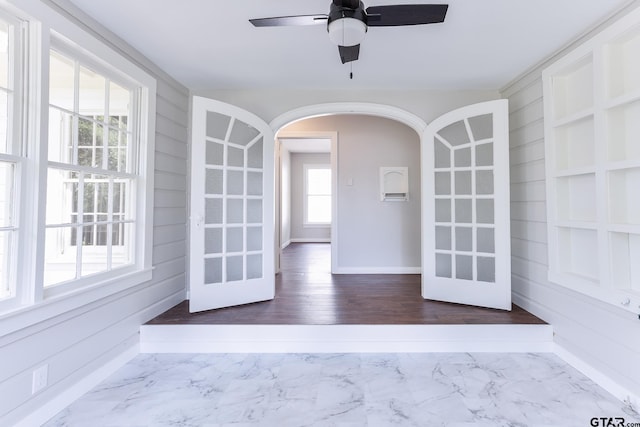 620 Dulse St, Tyler, TX 75701 - unfurnished sunroom with arched walkways