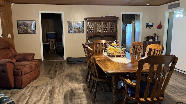 dining room featuring dark hardwood / wood-style flooring