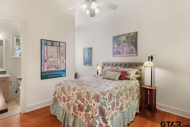 4007 Spartanburg Ln, Tyler, TX 75701 - bedroom with light wood-style floors, baseboards, connected bathroom, crown molding, and a ceiling fan